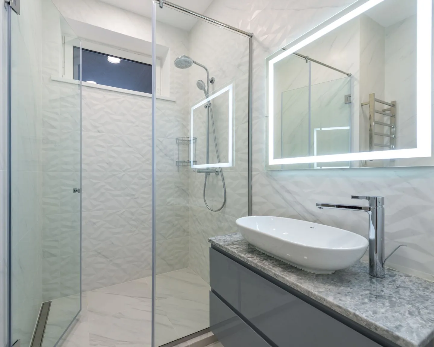 Stone-tiled bathroom with walk-in shower financed by a Bradford homeowner over monthly repayments