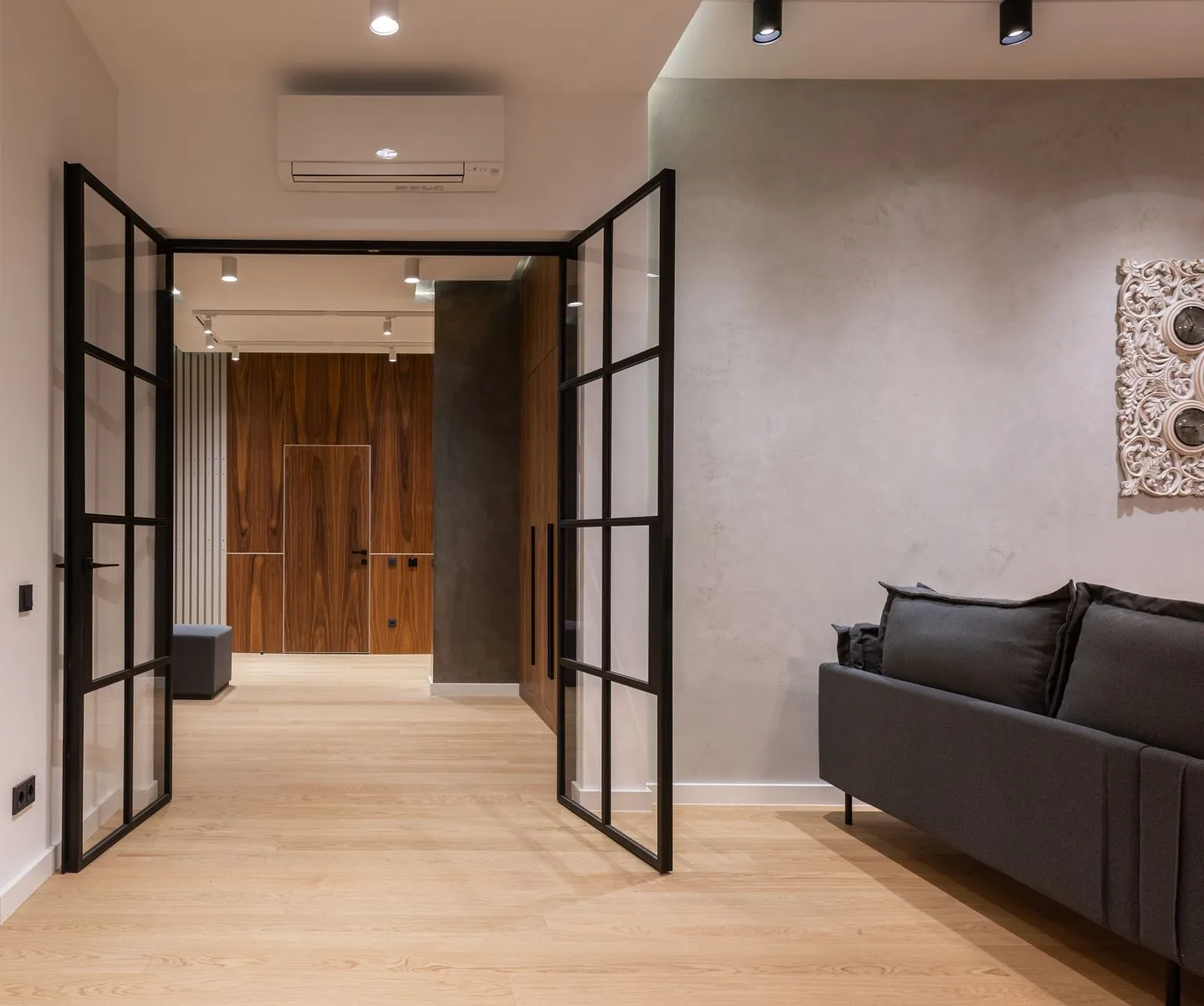 Home improvement project in Bradford showing a modern brick extension with bifold doors at twilight