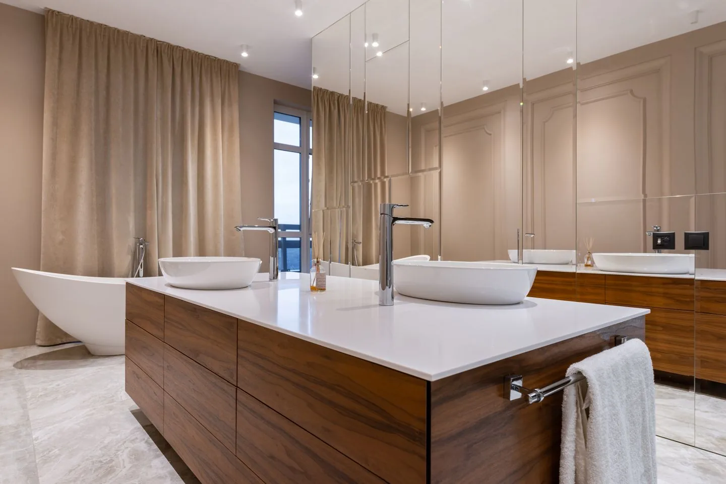 Bathroom installed by Maintain Home Solutions in Bradford with twin basins and a walk-in shower