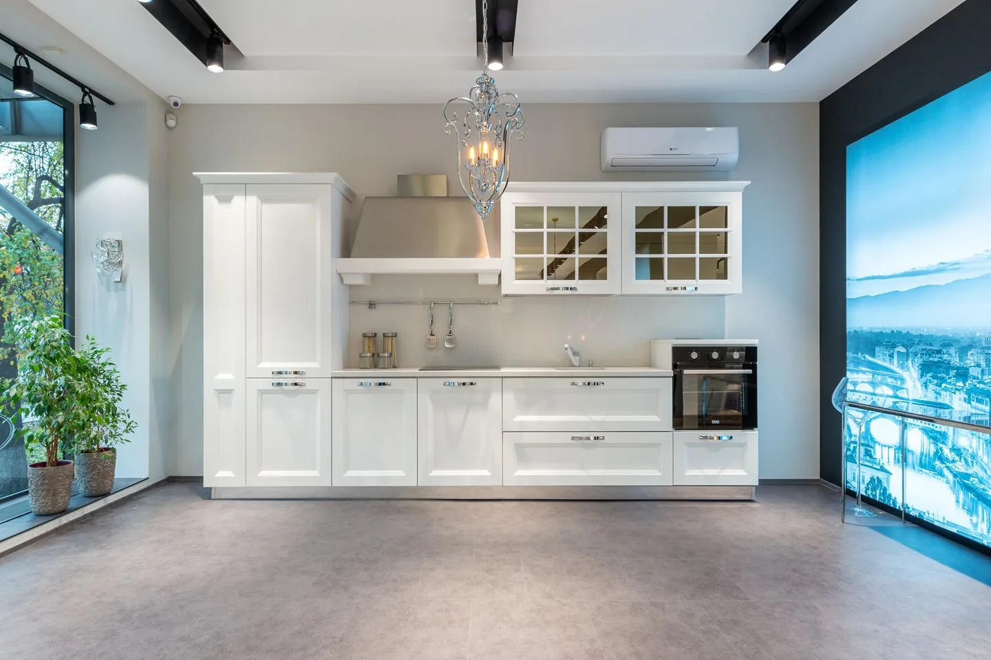 New fitted kitchen in West Yorkshire with grey and oak handleless units beneath a large skylight