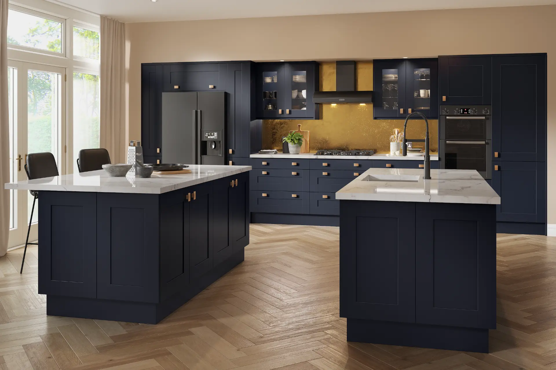 Navy shaker kitchen fitted in Leeds with brass handles and twin marble-topped islands