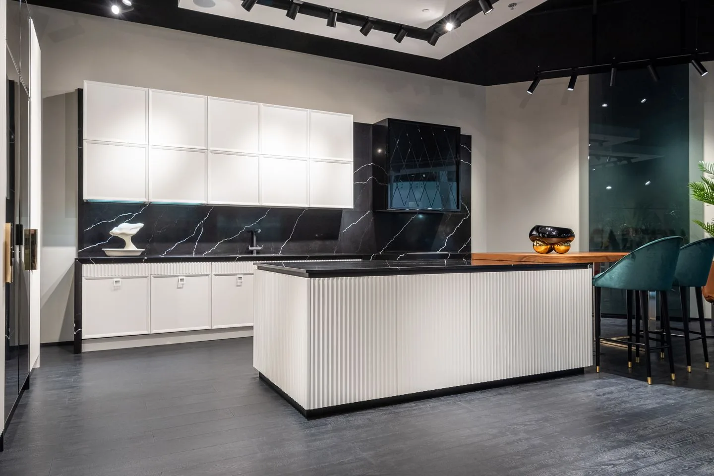 New fitted kitchen in Leeds with walnut and cashmere handleless units and a large white island